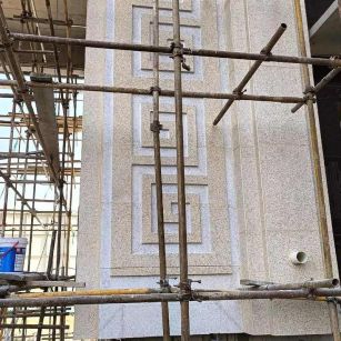 阳泉 黄金麻花岗岩别墅外墙干挂回纹造型效果