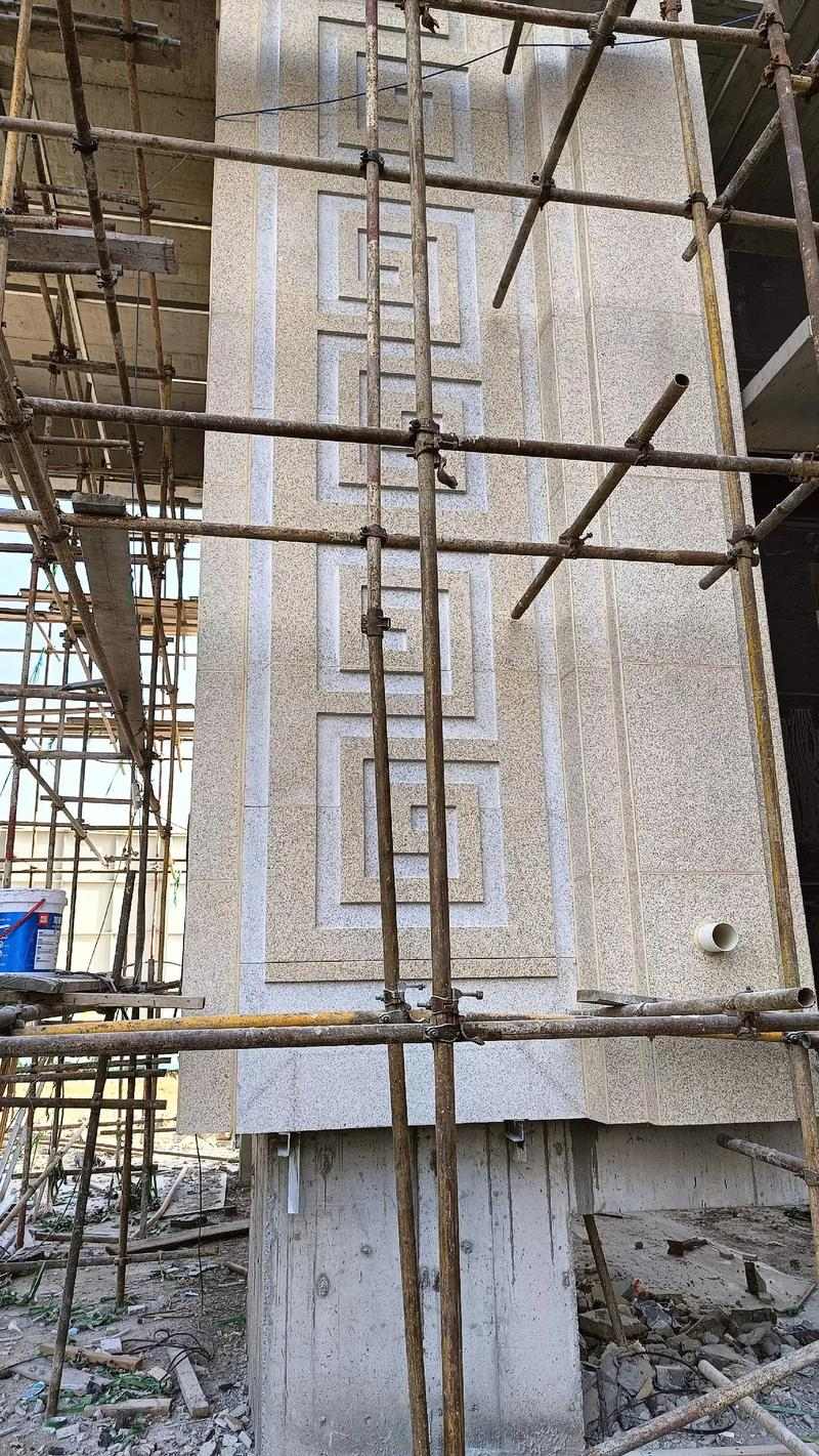 阳泉 黄金麻花岗岩别墅外墙干挂回纹造型效果